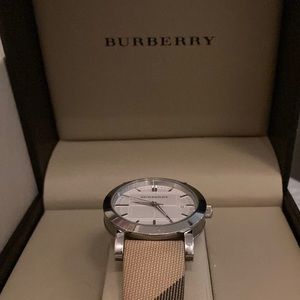 Classic Burberry watch. Canvas strap. Lightly used with tags